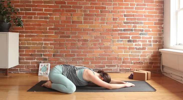 Cassandra Reinhardt teaches Child's Pose during a 10-minute morning yoga class