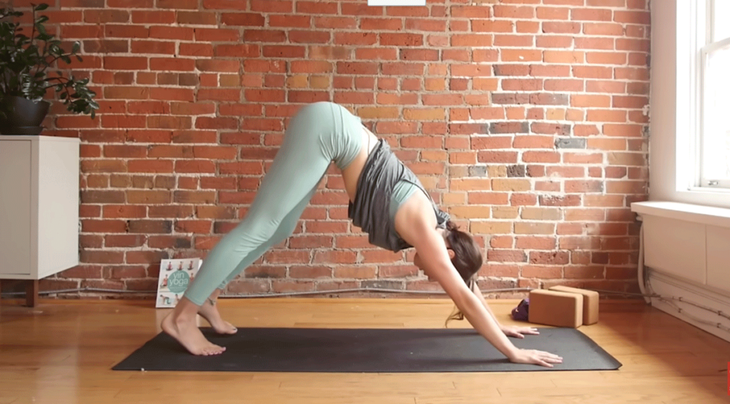 Cassandra Reinhardt teaches downward dog