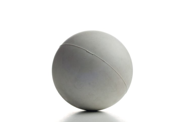 Lacrosse ball on a white background. It can be used to relieve muscle pain.