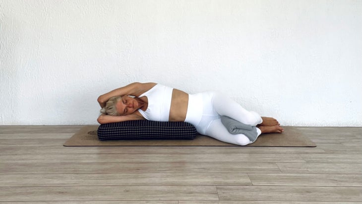 Restorative Yoga: Breathe Easier in Supported Side-Lying Stretch Pose -  YogaUOnline