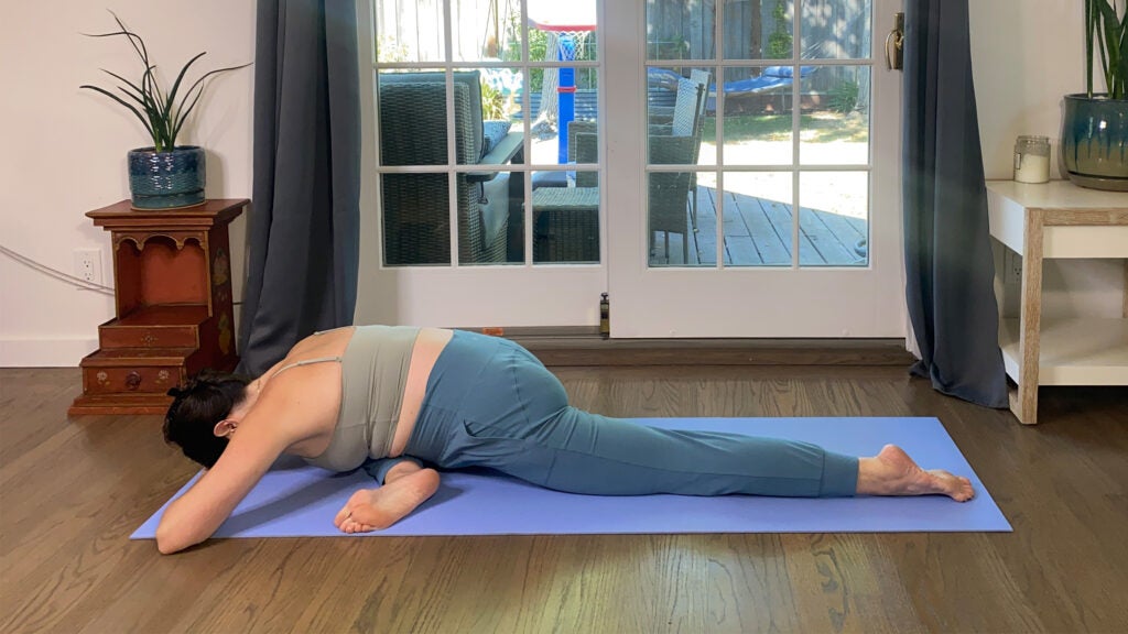 These five poses can help you beat bloating, according to a yoga teacher