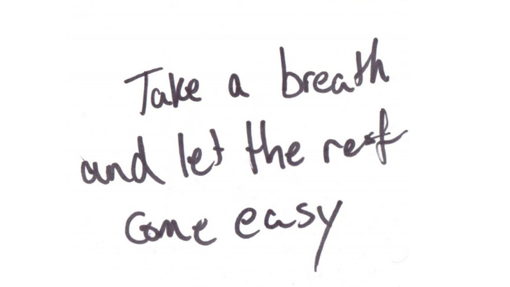 A black and white illustration of a handwritten quote about letting the rest come easy, signifying Venus in Libra