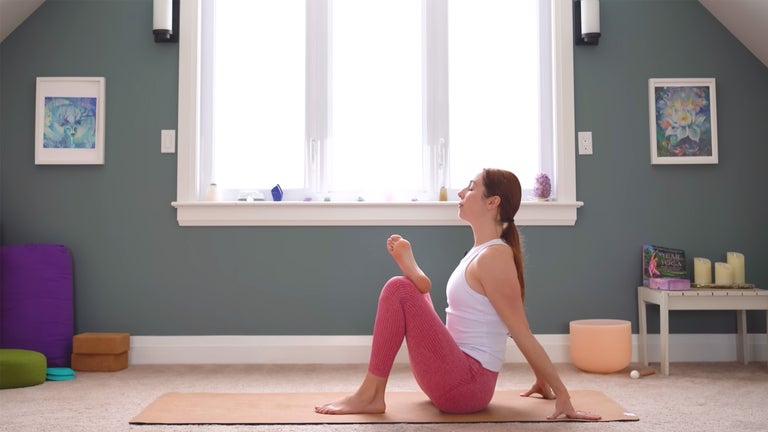 You may have tried this same pose lying on your back. Sitting allows you to more easily adjust the intensity of the stretch by sliding your mat foot closer or farther away from you. (Photo: Yoga With Kassandra)