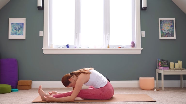 This effective stretch combines one bent leg and one straight leg allows for the many subtle ways our bodies aren’t symmetrical. It targets the lower back, hamstrings, and inner thighs. (Photo: Yoga With Kassandra)