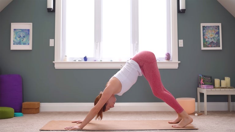 A classic, Down Dog can, in time, feel like a resting pose. Until then, continue to find ease wherever you can by releasing tension in your upper shoulders, neck, and jaw. (Photo: Yoga With Kassandra)