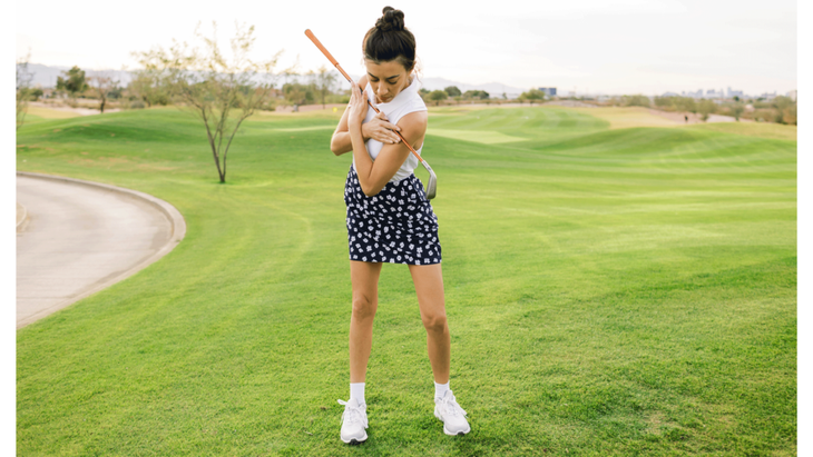 Woman golfer on Papago Golf Course in Phoenix practicing the best exercises for golf swings