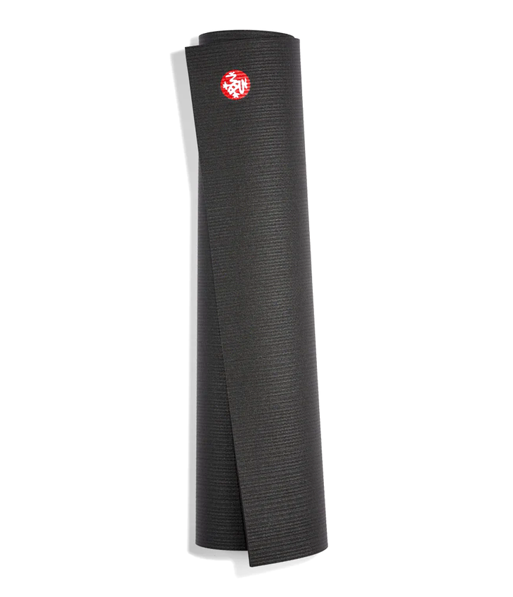 Image of a Manduka PRO 6mm yoga mat in black with a red logo