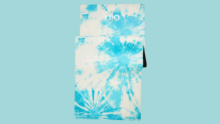 A blue and white tie dyed yoga mat