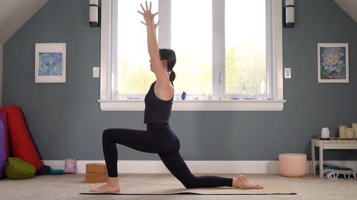 woman does yoga for core strength on a mat