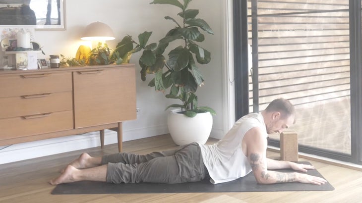 lower back strengthening yoga poses from a man on a mat