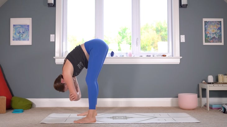 woman practicing gentle yoga poses on a mat