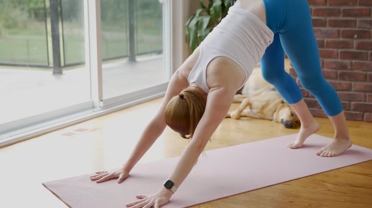 woman on a yoga mat practicing for focus