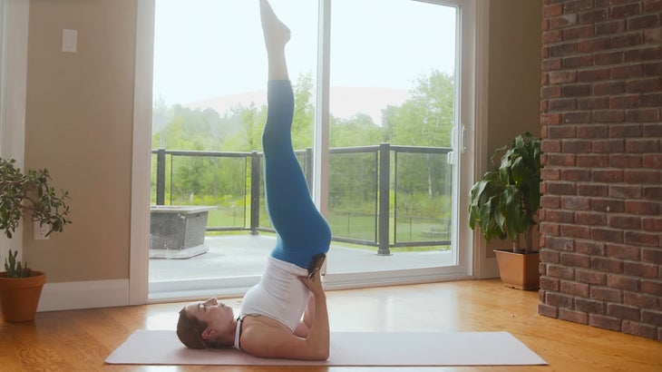 woman on a yoga mat practicing for focus