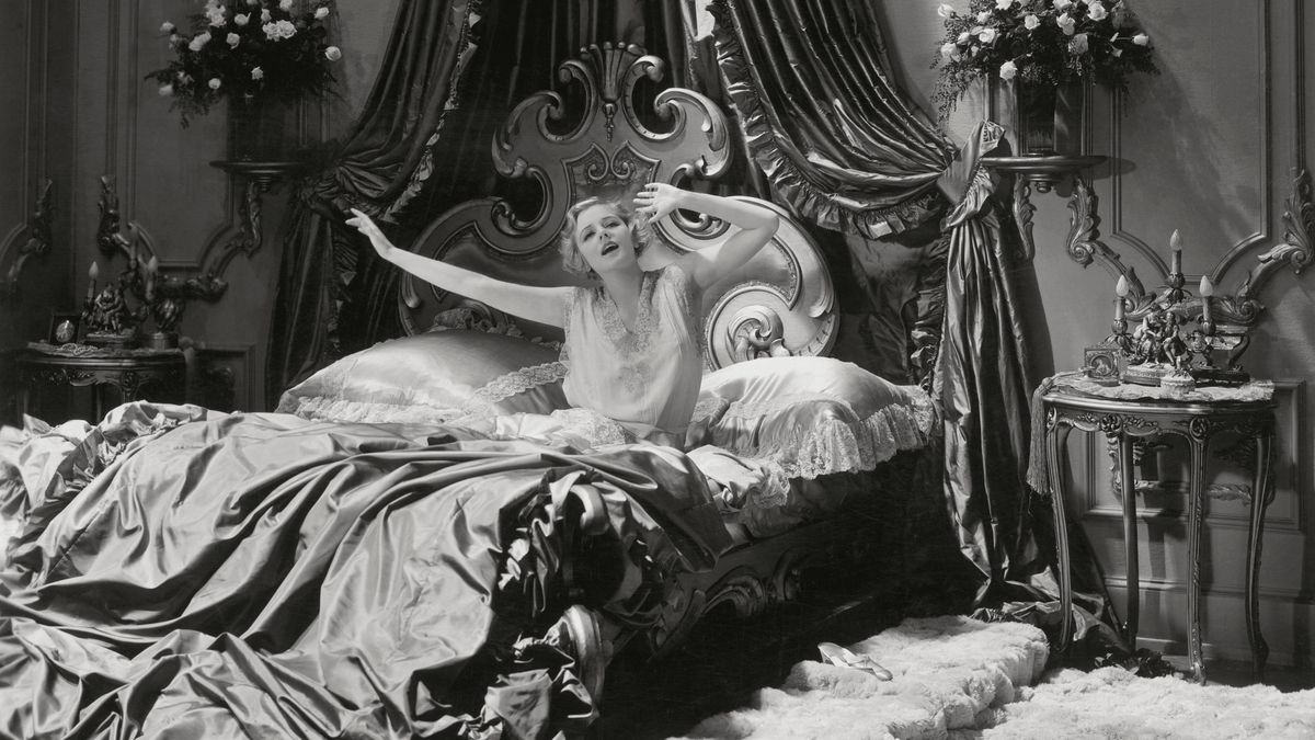 Morning Yoga for Lower Back Pain and Stiffness (That You Can Do In Bed)