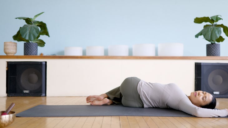 Reclined Twist on a yoga mat