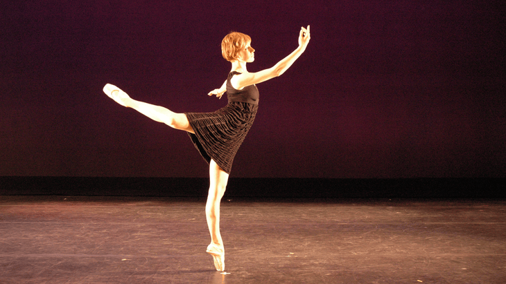 The author dancing on stage before she found yoga