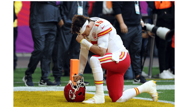 Kansas City Chiefs' quarterback Patrick Mahomes kneels as he summons mental resilience