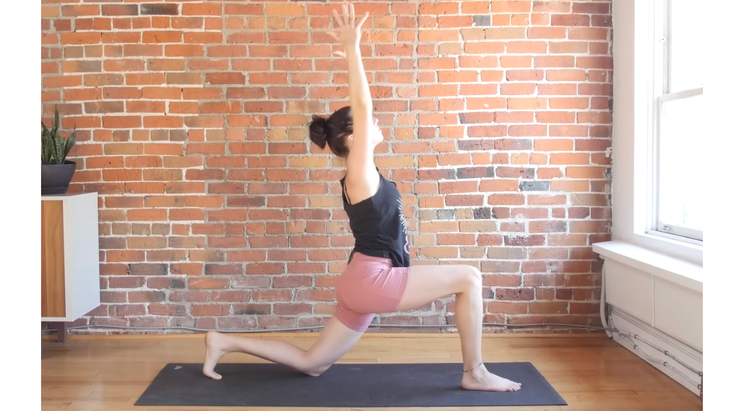 Woman in Low Lunge on a yoga mat