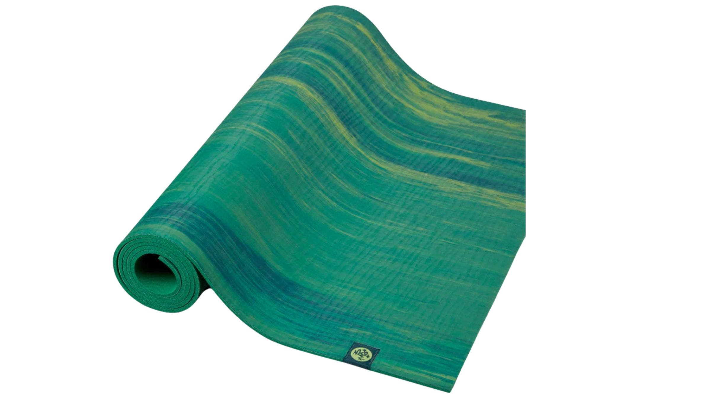 Product image of half unrolled green yoga mat