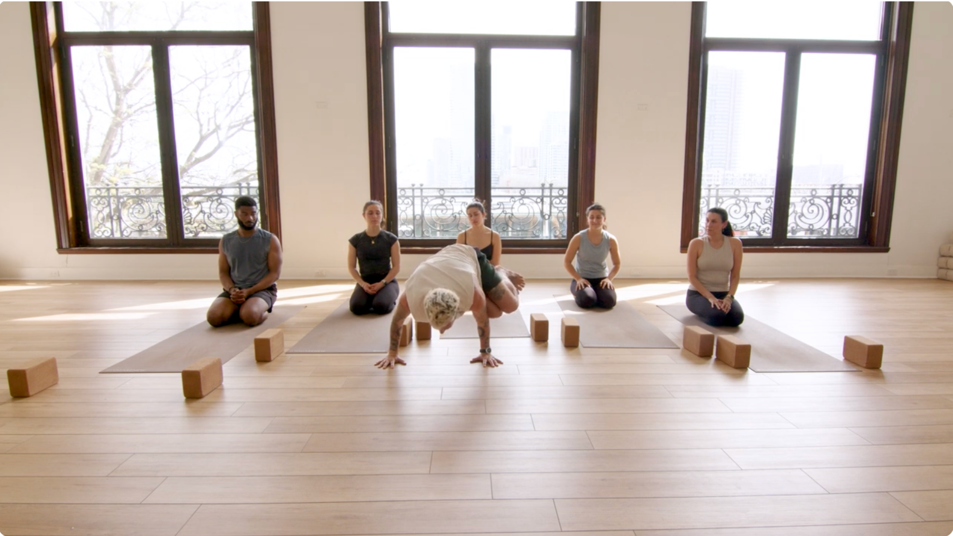 Yoga class leading up to Side Crow or Parsva Bakasana led by Patrick Franco of Yoga Renew