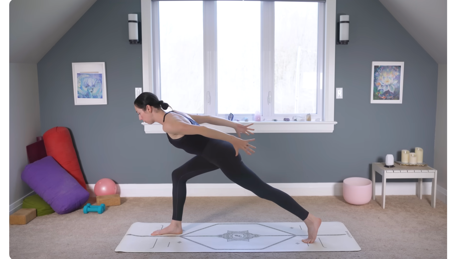 Yoga teacher leaning forward in a High Lunge