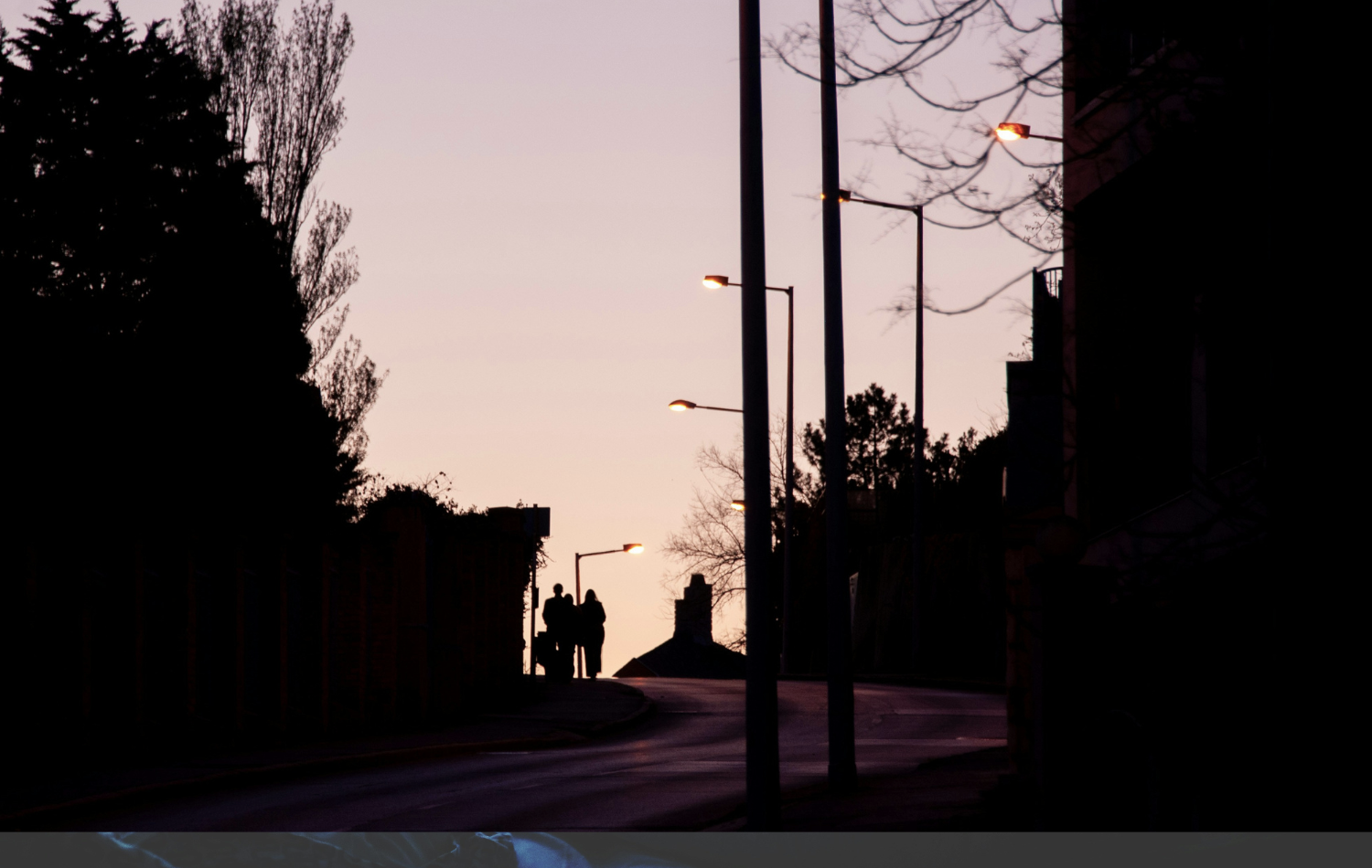 Family taking a walk at night before falling asleep