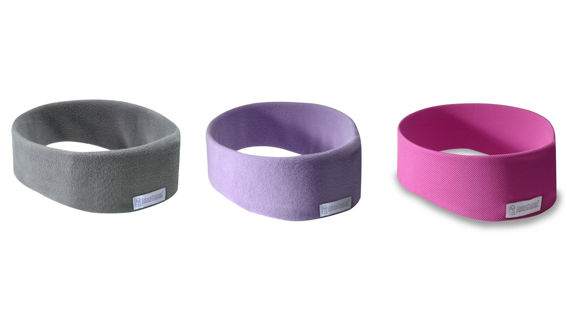 AcousticSheep sleep headphones in grey fleece, lavender fleece, and pink Breeze
