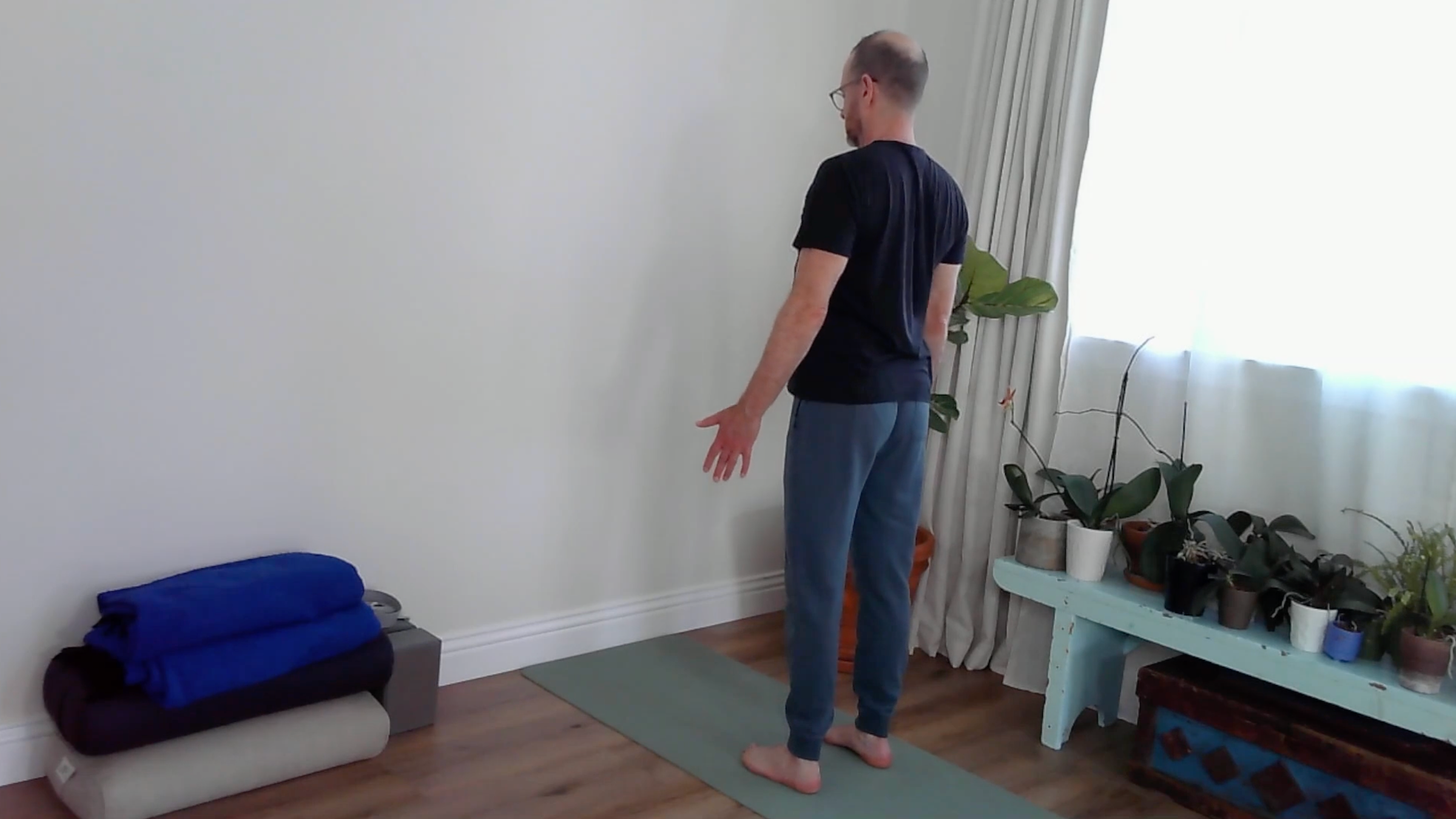 A yoga teacher in Mountain Pose