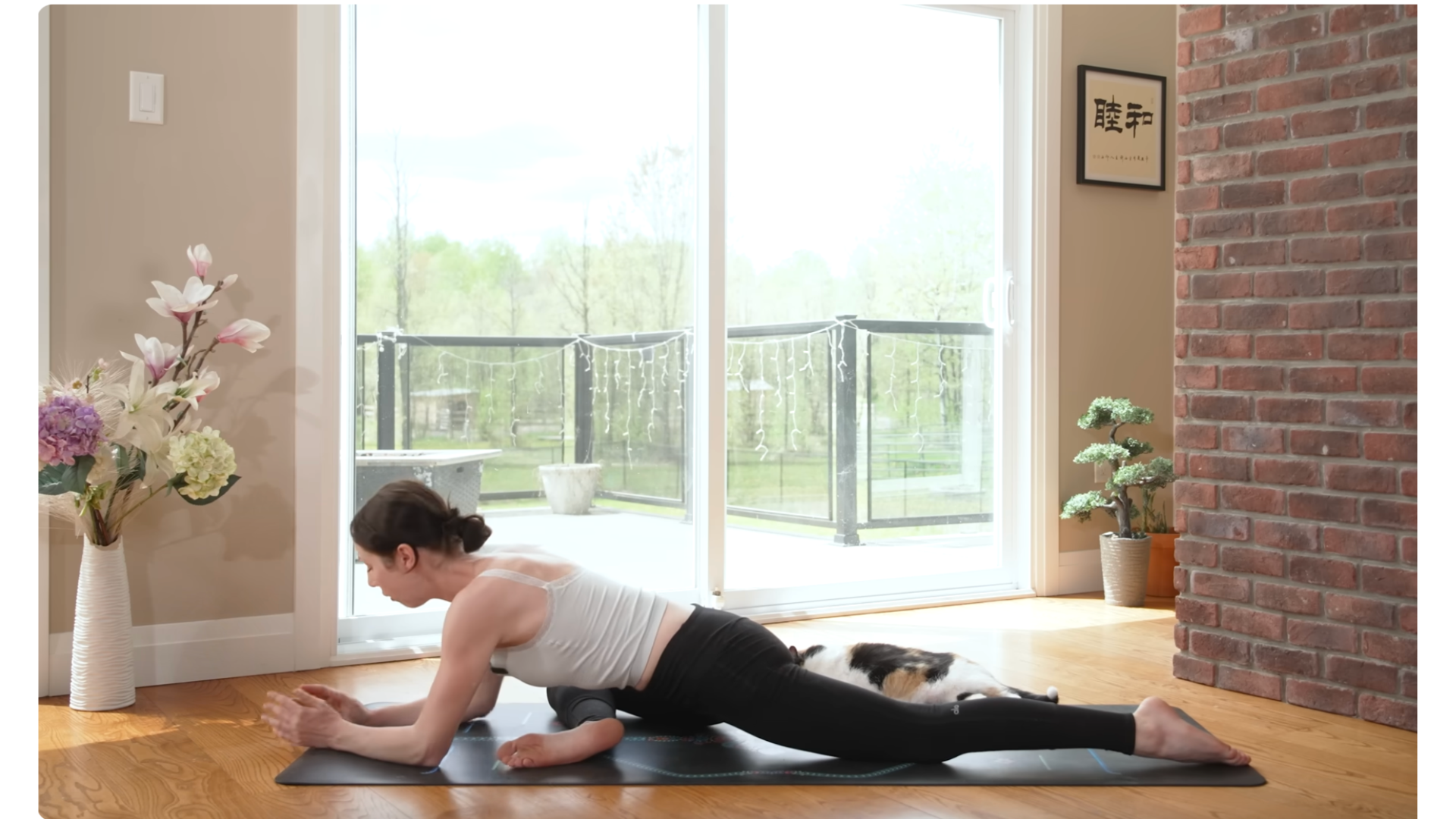 Yoga teacher in Pigeon Pose
