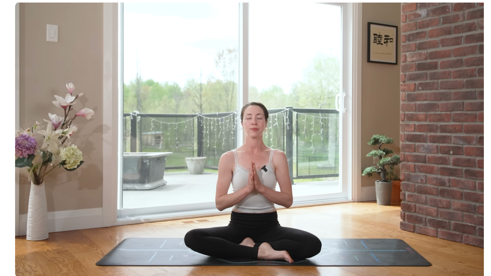 Yoga teacher sitting in meditation