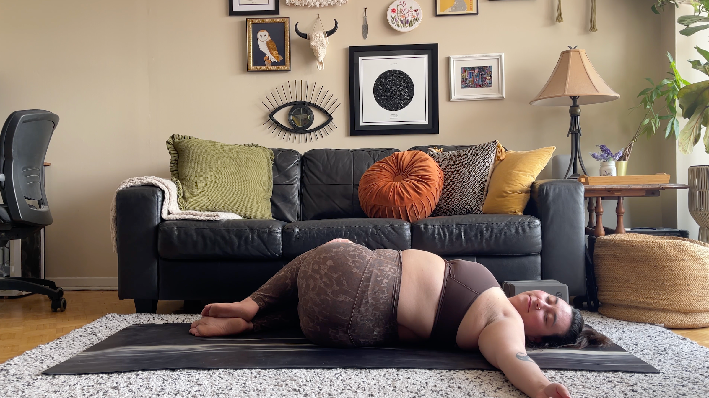 yoga teacher taylor lorenz in reclined twist