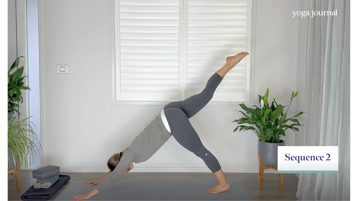 Yoga teacher on a yoga mat answering the question, "Is yoga cardio?" by practicing a sequence