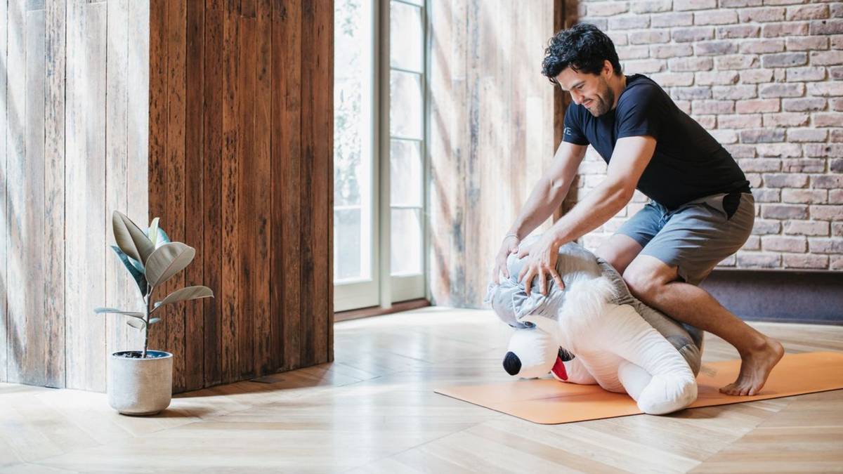 Should Yoga Teachers Ever Give Hands-On Adjustments? Here Are 5 Things to Consider.