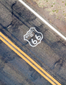 Route 66 painted on the two-lane highway asphalt