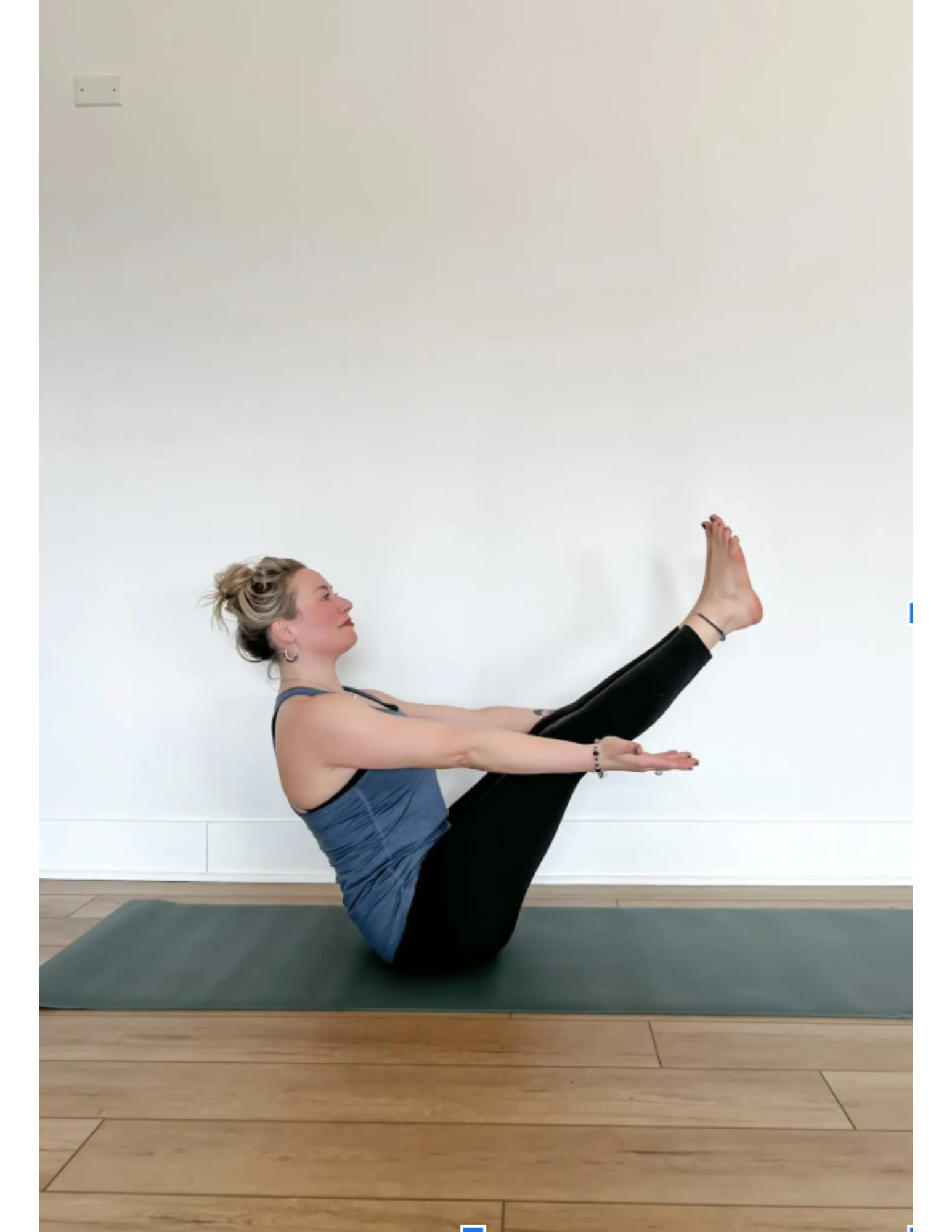 Yoga teacher Lisa Bermudez practicing Boat Pose
