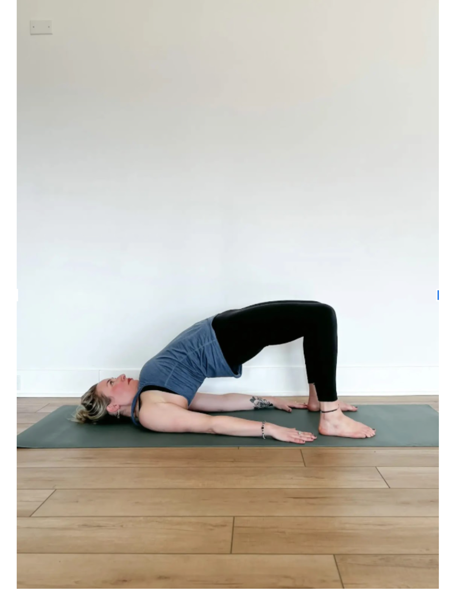 Yoga teacher Lisa Bermudez practicing Bridge Pose