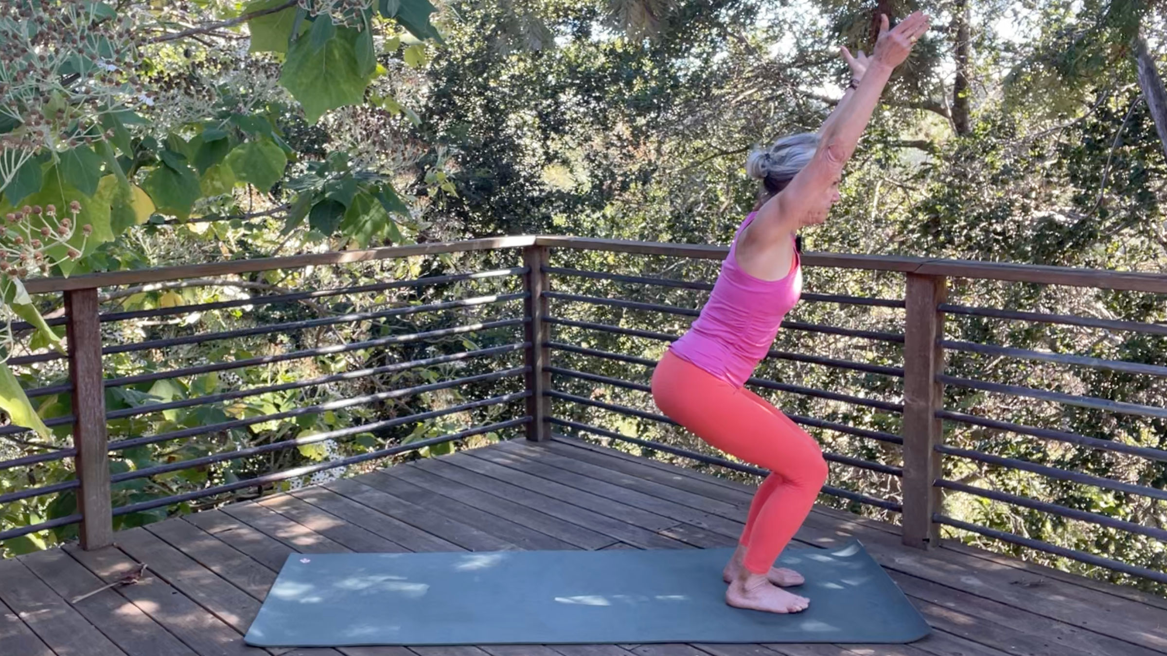 ndrea Marcum practicing Chair Pose in her yoga for strength routine