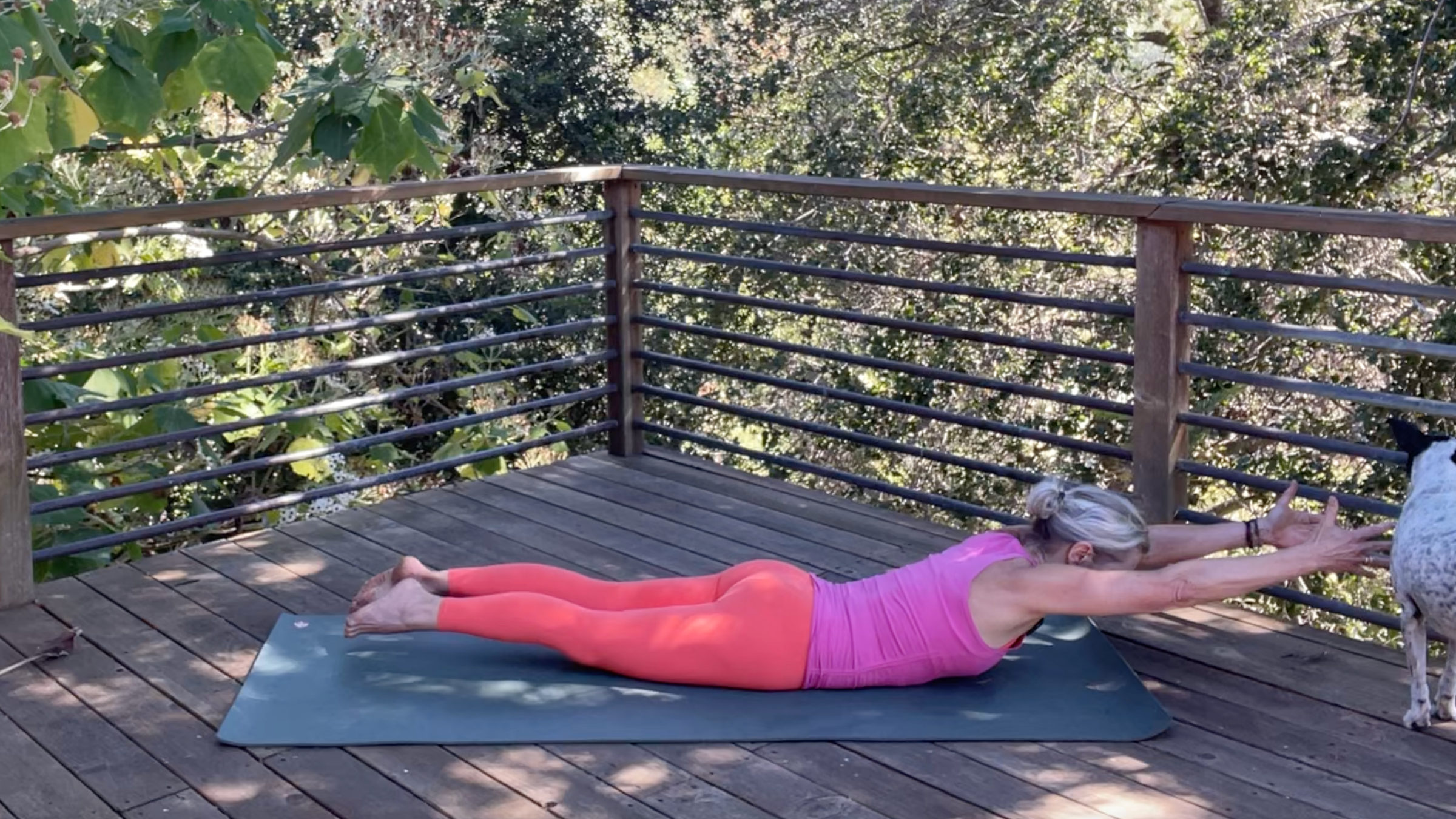 Andrea Marcum practicing Locust Pose