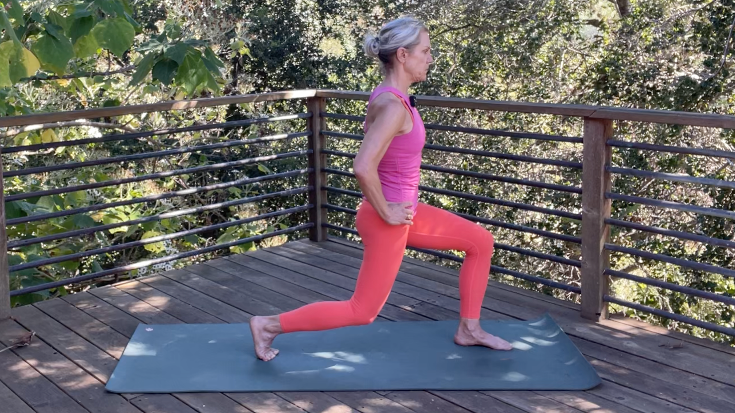 Andrea Marcum practicing Low Lunge in her yoga for strength routine