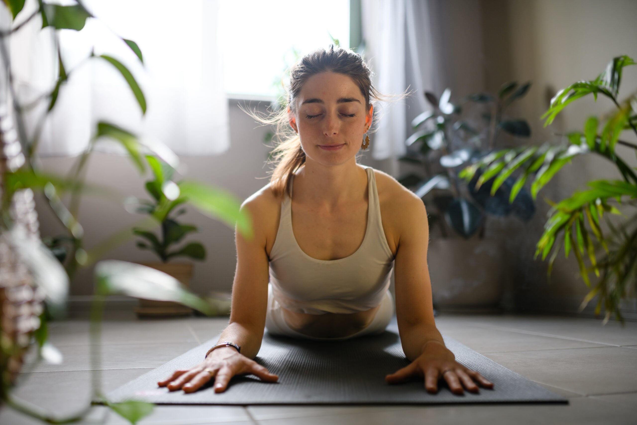 Woman practicing Sphinx Pose