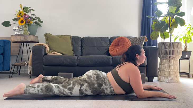 Yoga teacher Taylor Lorenz in Sphinx Pose