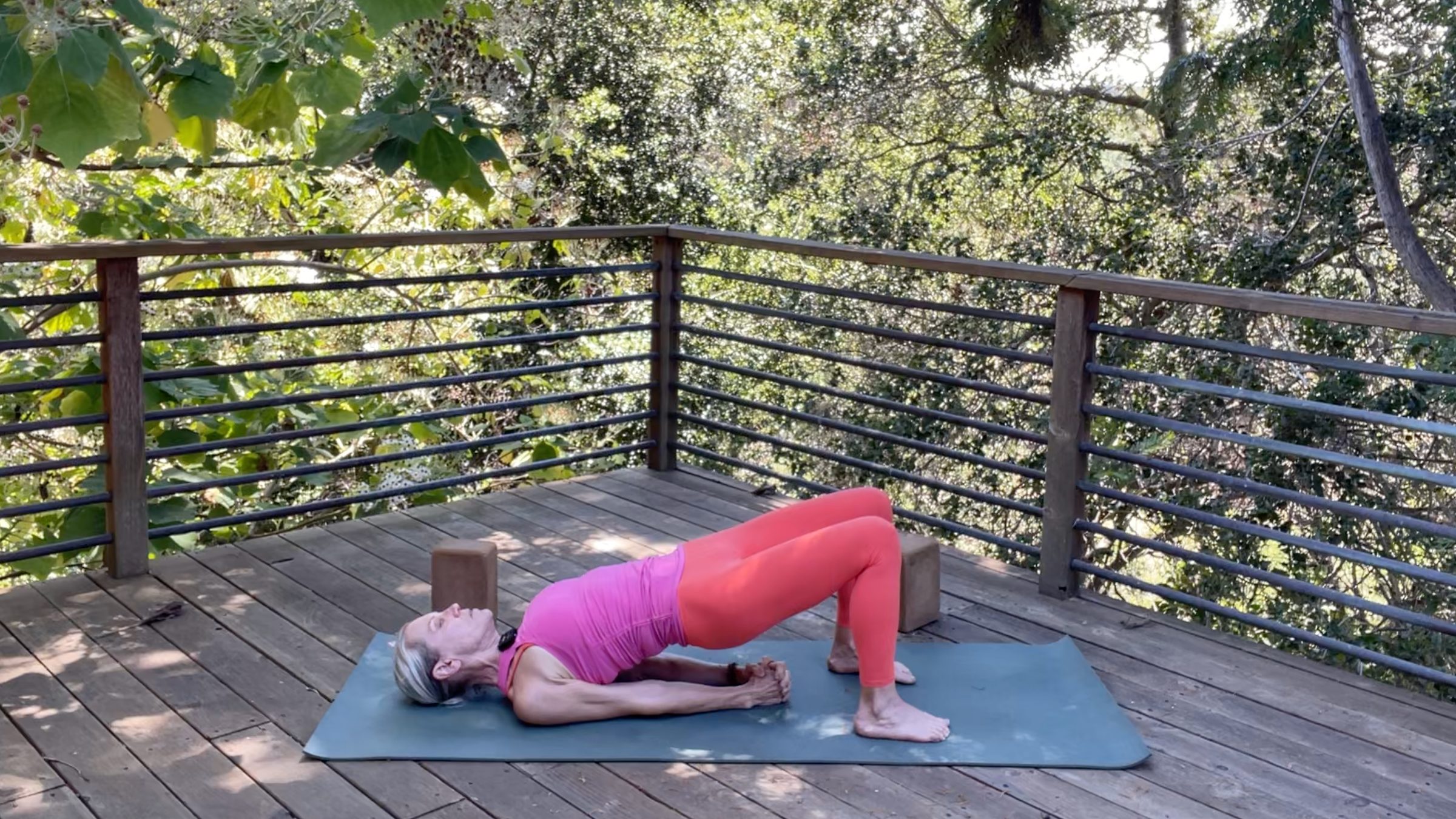 Yoga teacher Andrea Marcum in Bridge Pose