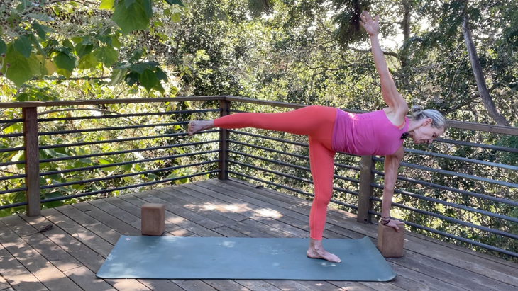 Yoga teacher Andrea Marcum in Half Moon