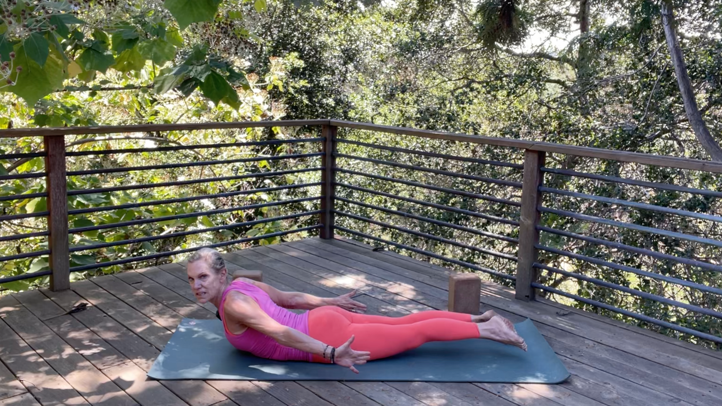 Yoga teacher Andrea Marcum in Locust Pose
