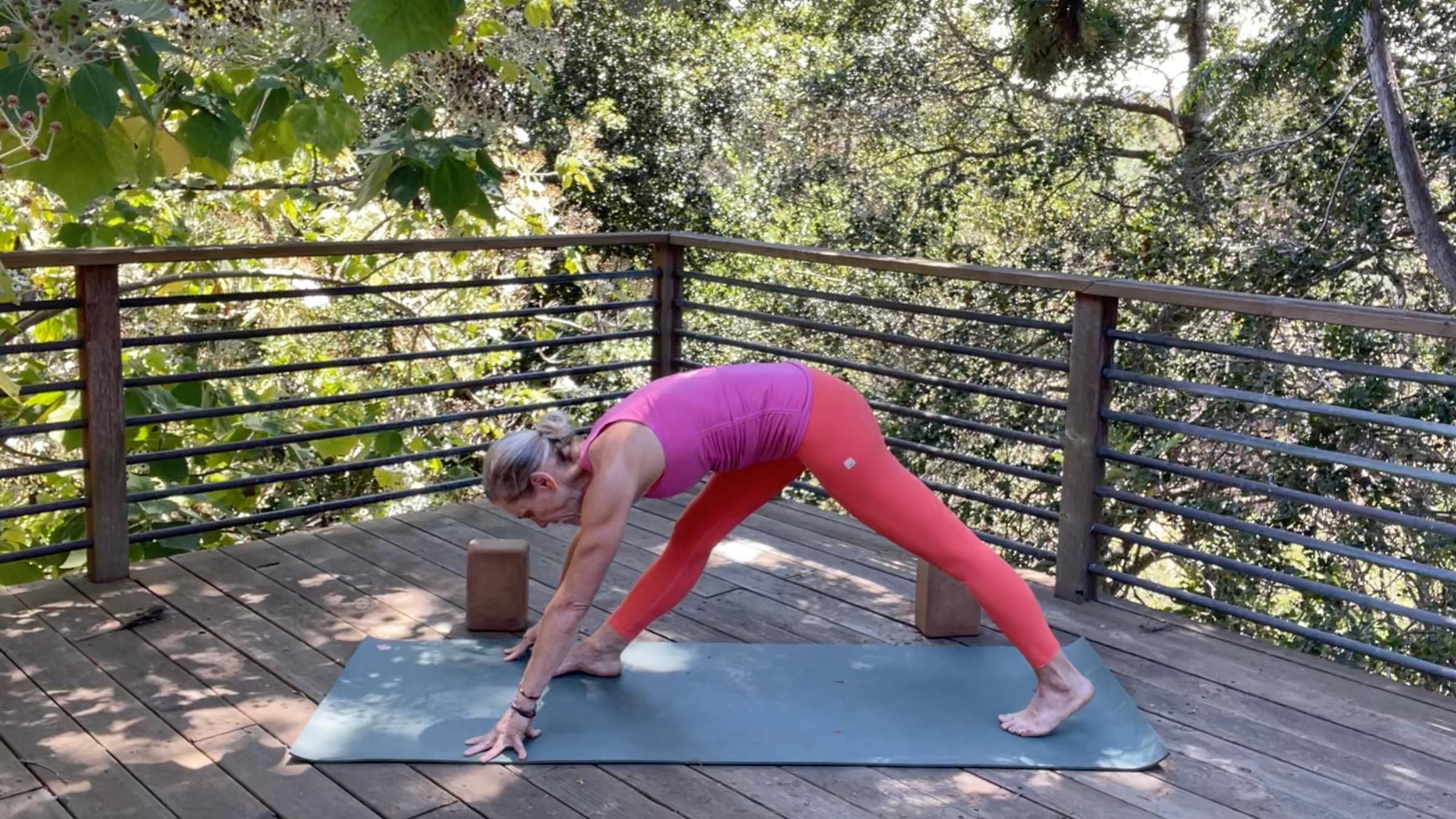 Yoga teacher Andrea Marcum in Pyramid Pose, part of her morning yoga practice