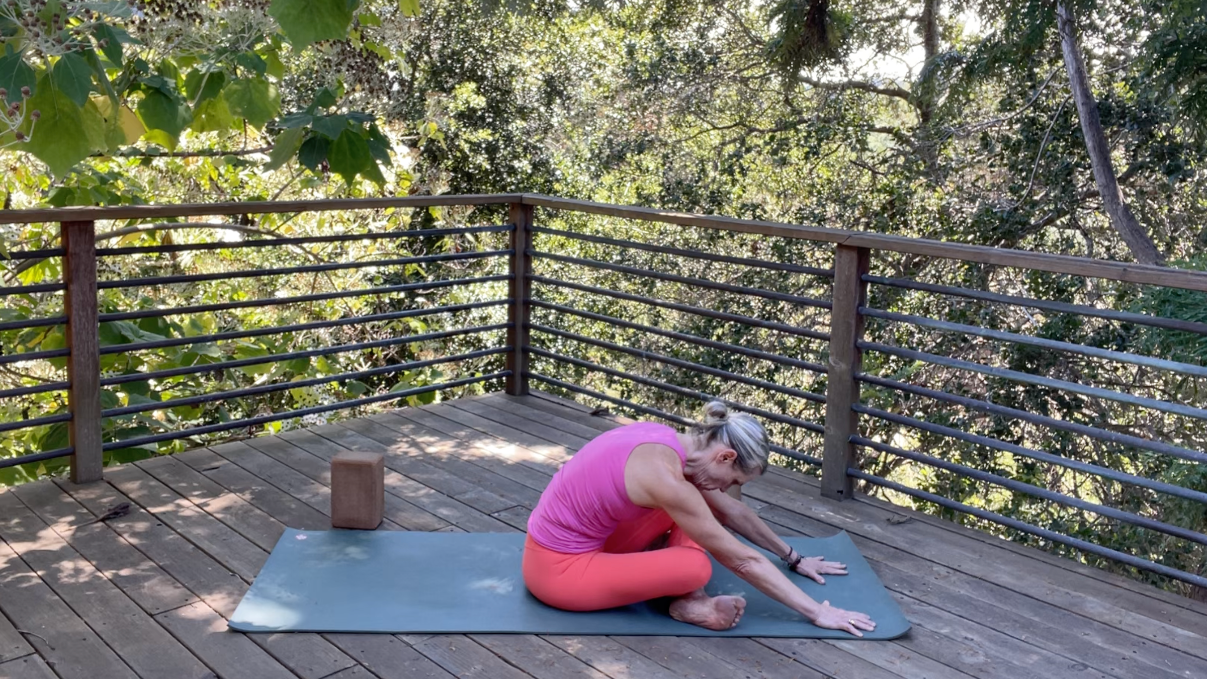 Yoga teacher Andrea Marcum in Seated Forward Bend