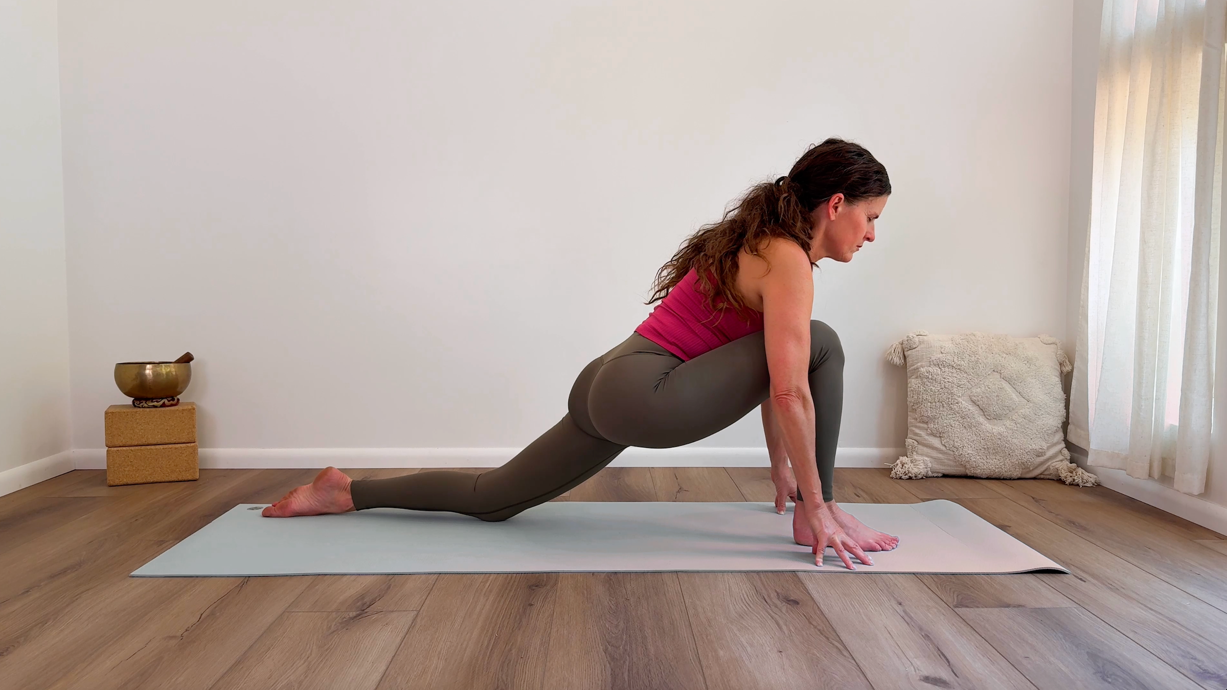 Yoga teacher Devi Daly in Low Lunge