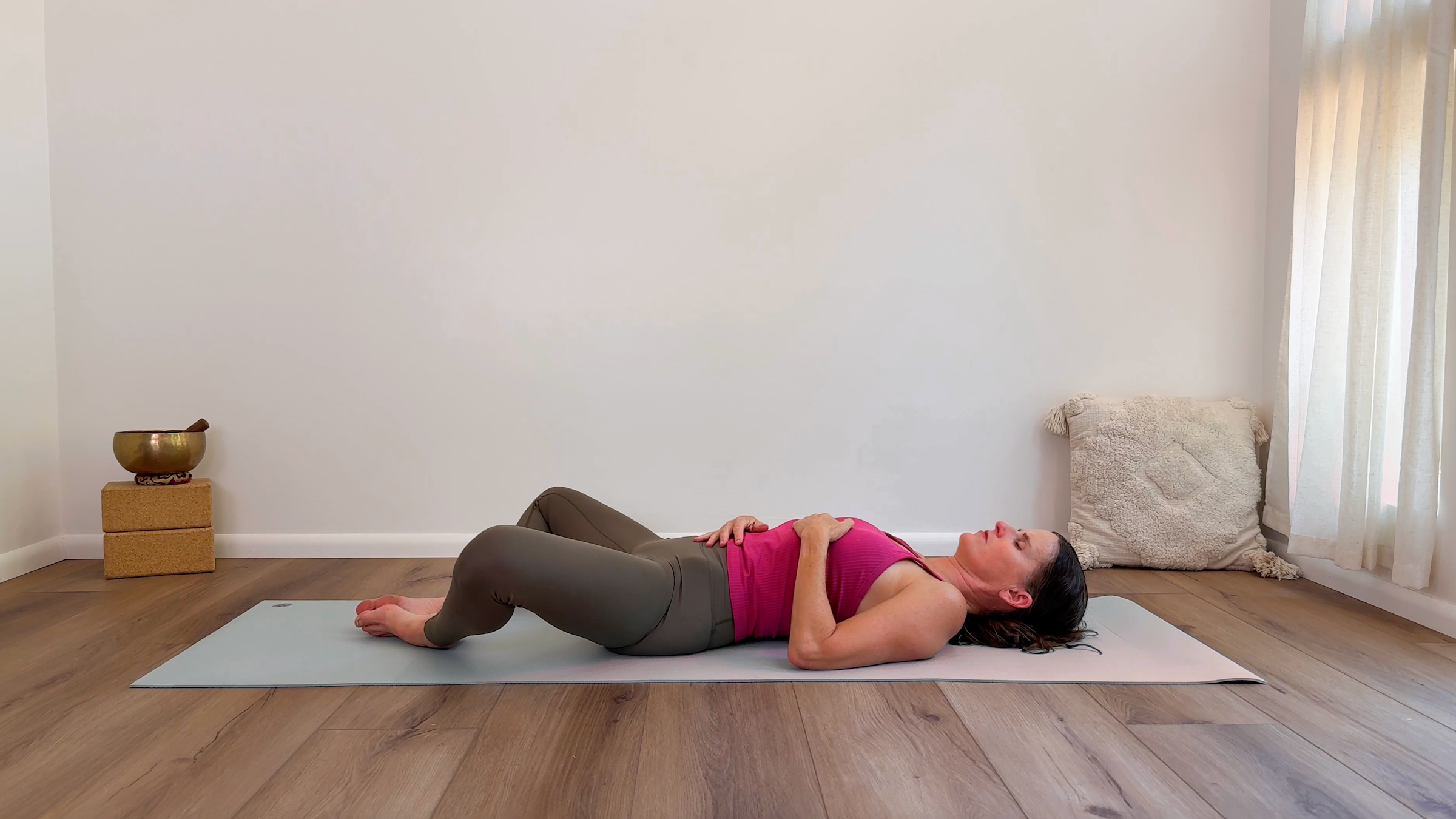 Yoga teacher Devi Daly in Reclined Butterfly