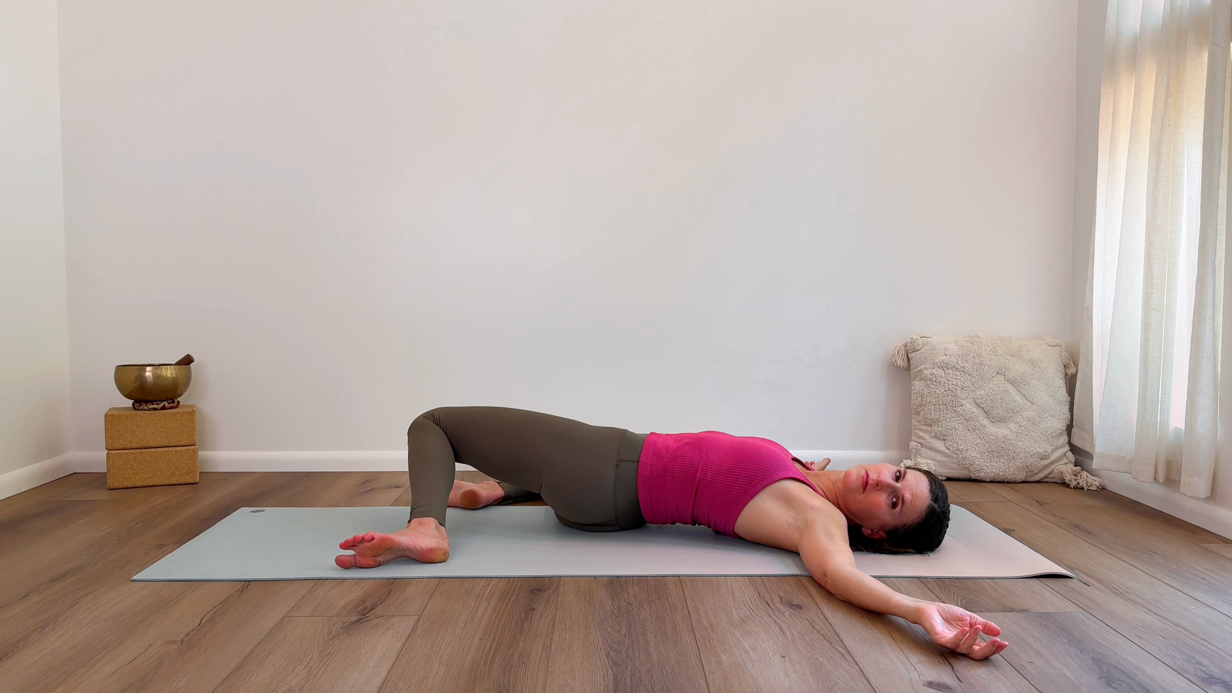 Yoga teacher Devi Daly leads a somatic yoga practice in Windshield Wipers