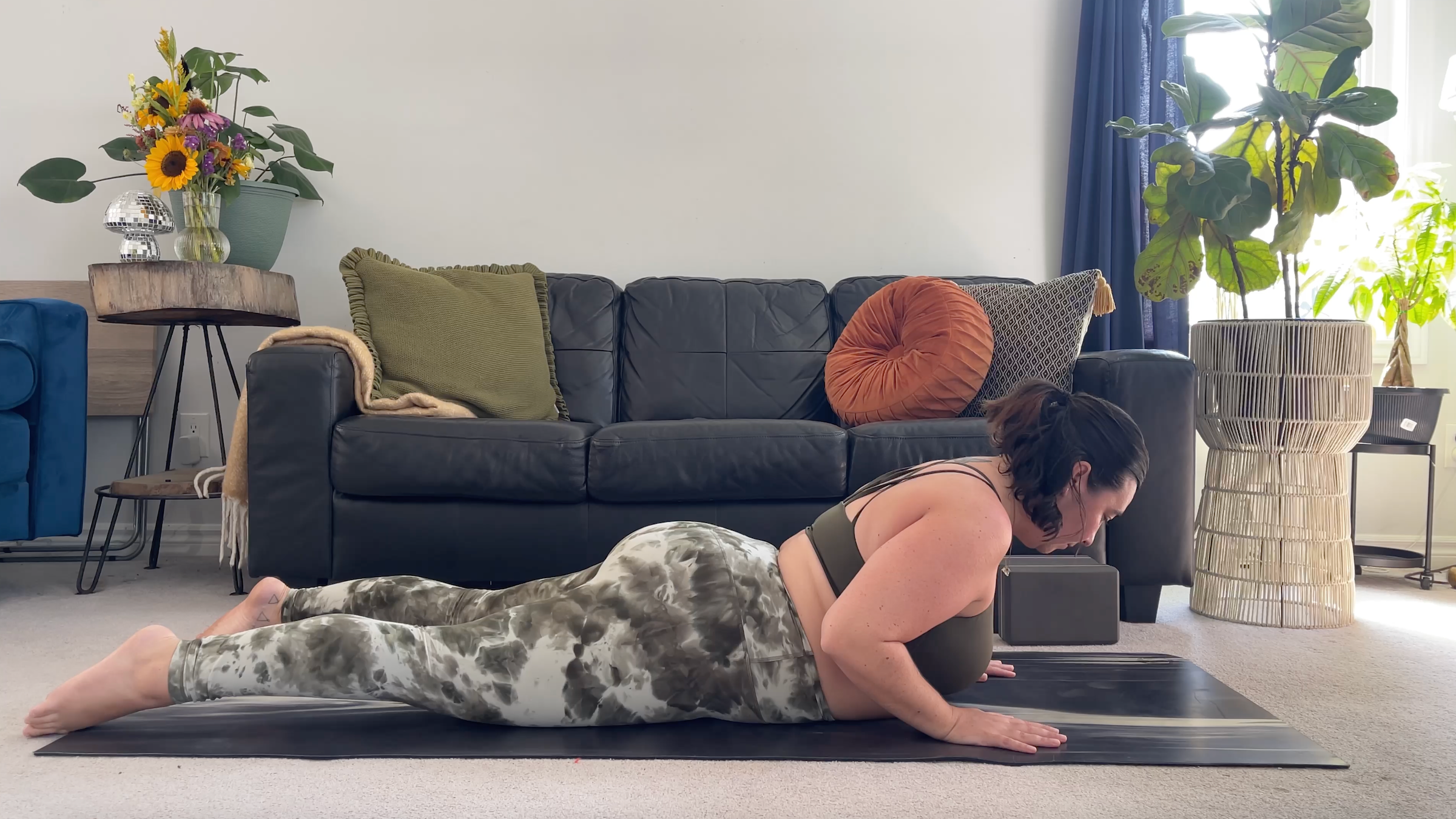 Yoga teacher Taylor Lorenz in Baby Cobra Pose